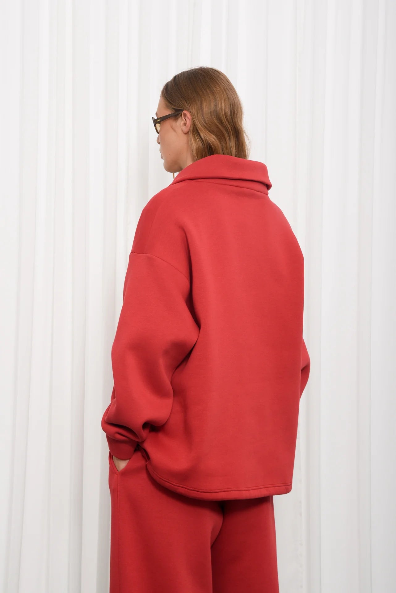 SELFHOOD ZIPPED SWEATER RED